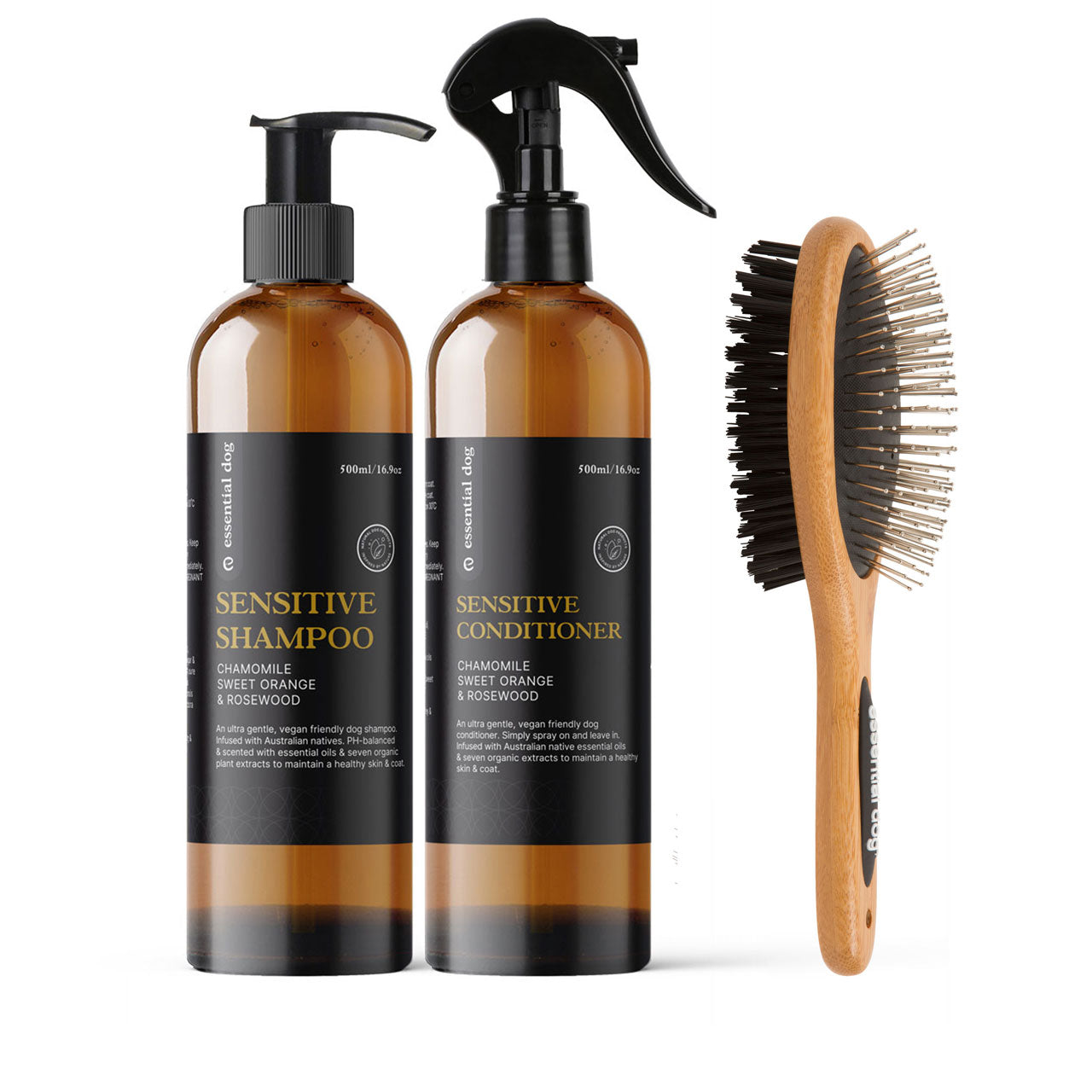 Essential Dog Sensitive shampoo and conditioner bottles with a bamboo doble-sided brush on a white background