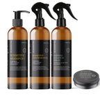 Set of three amber bottles labeled 'Sensitive Shampoo', 'Sensitive Conditioner', and 'Dermal Scratch Spray' with a small round container on a white background.
